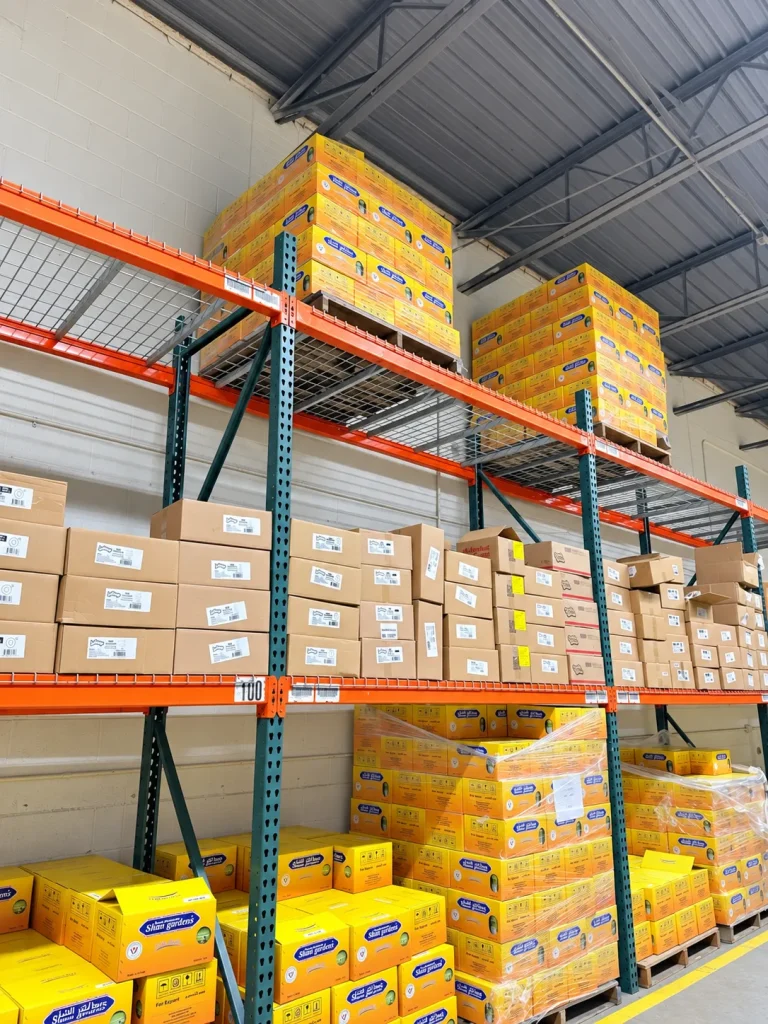 Steel pallet racking loaded with boxed inventory