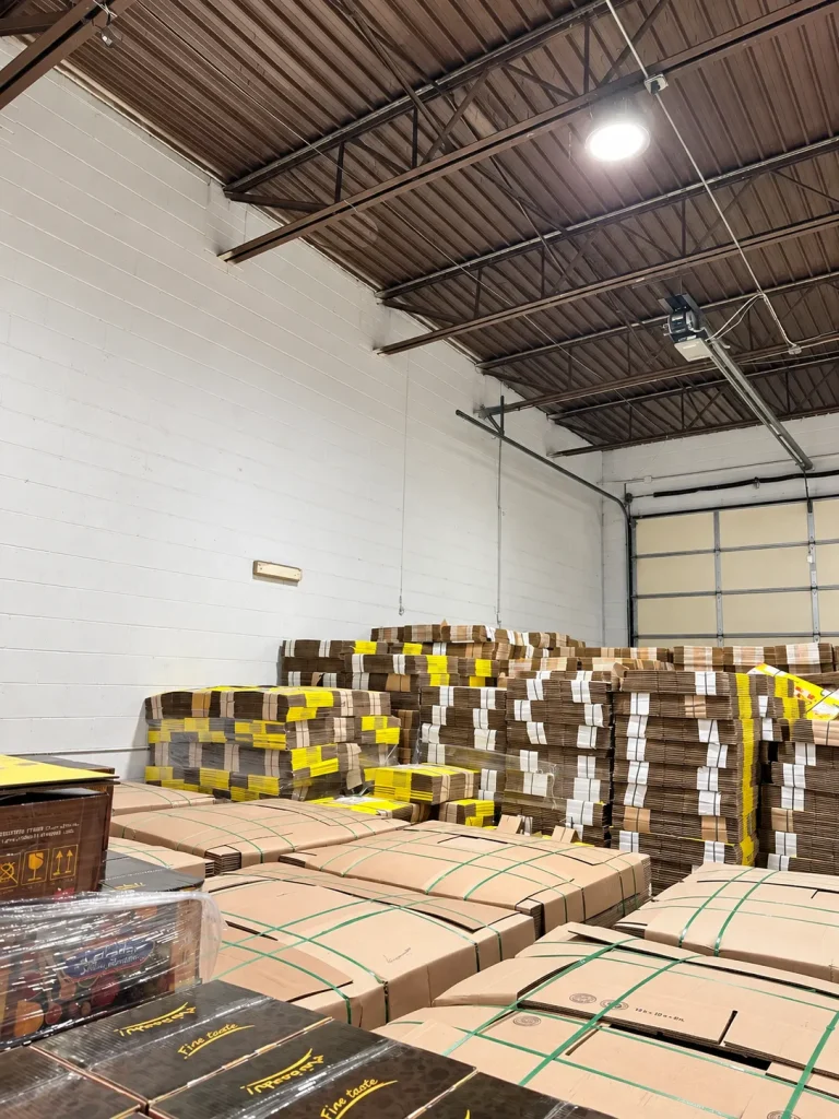 Pallets and boxes staged for shipment at Nearby Fulfillment warehouse